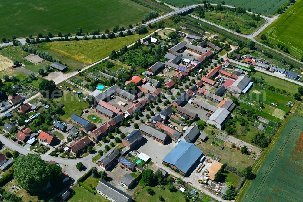 Aerial photograph Tornau - Agricultural land and field boundaries surround the settlement area of the village in Tornau in the state Saxony-Anhalt, Germany