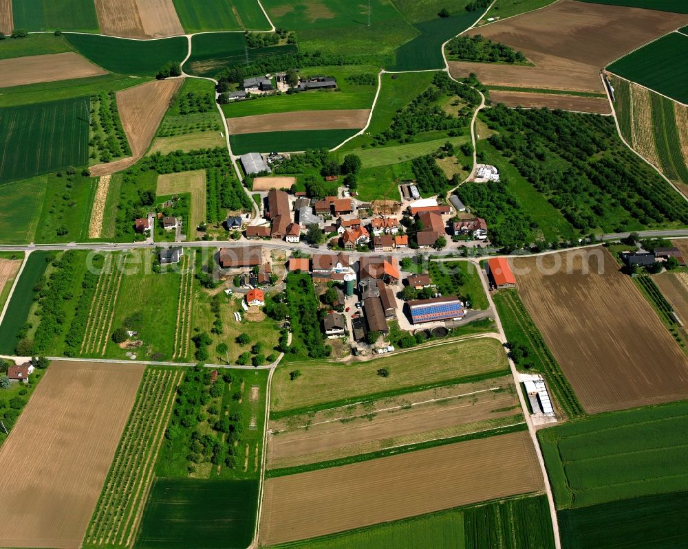 Aerial photograph Ungeheuerhof - Agricultural land and field boundaries surround the settlement area of the village in Ungeheuerhof in the state Baden-Wuerttemberg, Germany
