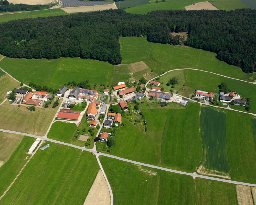 Unghausen from the bird's eye view: Agricultural land and field boundaries surround the settlement area of the village in Unghausen in the state Bavaria, Germany
