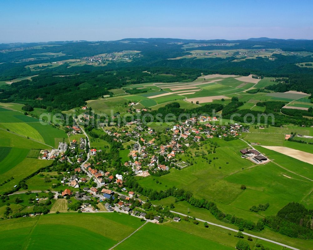 Unteralpfen from above - Agricultural land and field boundaries surround the settlement area of the village in Unteralpfen in the state Baden-Wuerttemberg, Germany