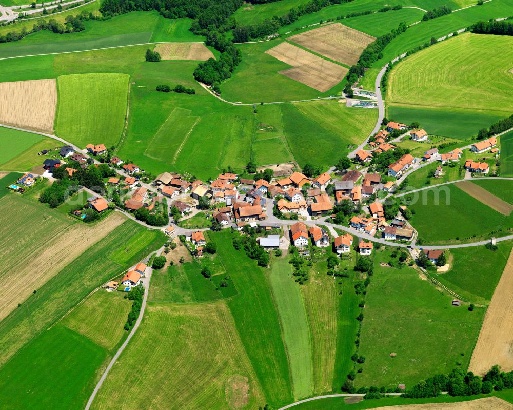 Unterhöhenstetten from above - Agricultural land and field boundaries surround the settlement area of the village in Unterhöhenstetten in the state Bavaria, Germany