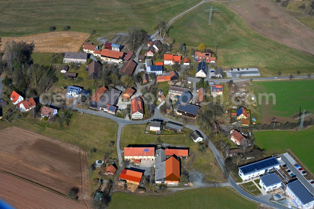Unterkonnersreuth from the bird's eye view: Agricultural land and field boundaries surround the settlement area of the village in Unterkonnersreuth in the state Bavaria, Germany