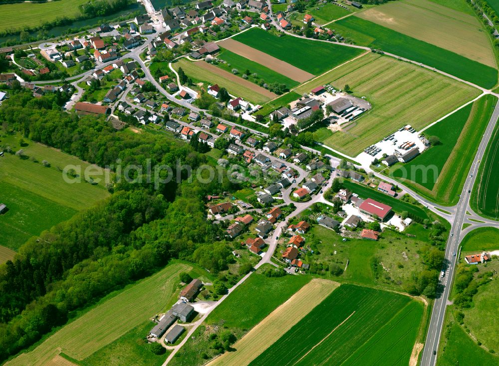 Untermarchtal from above - Agricultural land and field boundaries surround the settlement area of the village in Untermarchtal in the state Baden-Wuerttemberg, Germany
