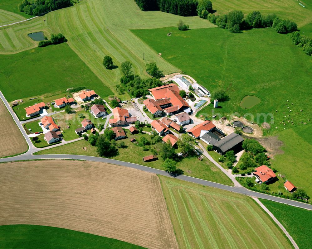 Vordereben from above - Agricultural land and field boundaries surround the settlement area of the village in Vordereben in the state Bavaria, Germany