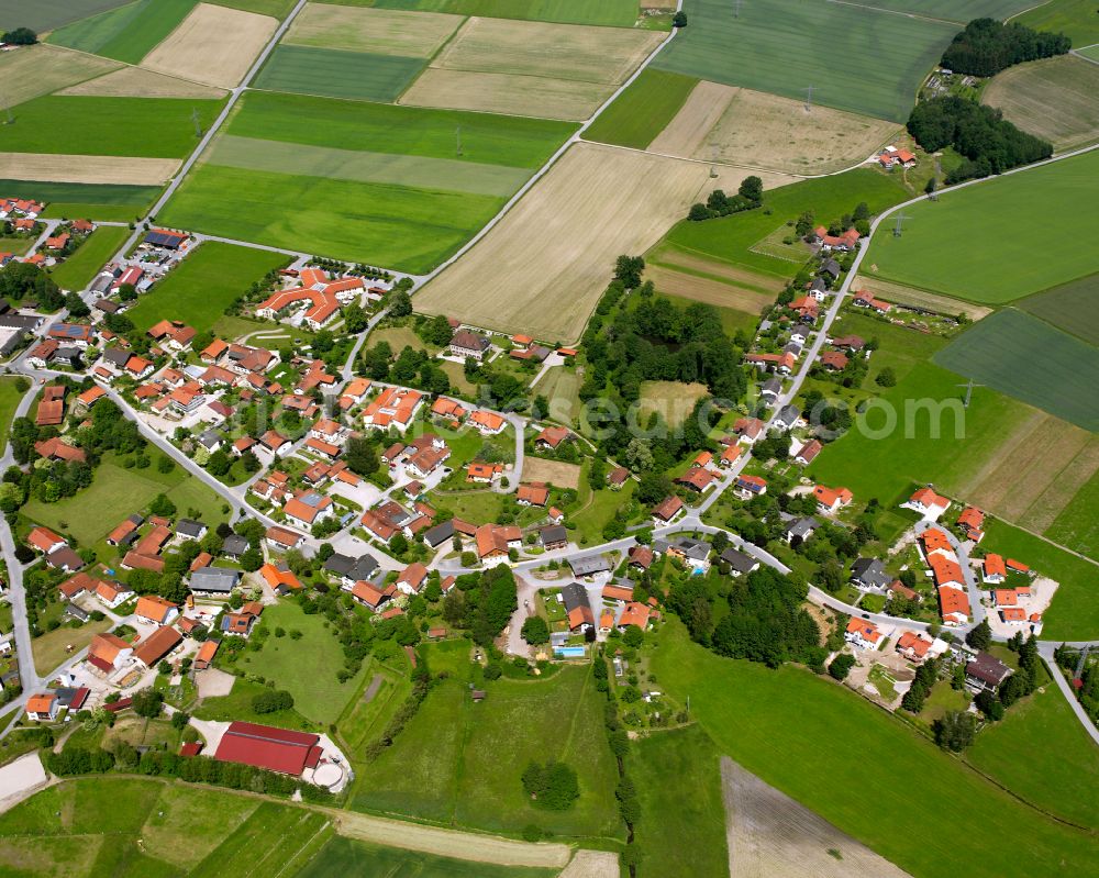 Vordorf from above - Agricultural land and field boundaries surround the settlement area of the village in Vordorf in the state Bavaria, Germany