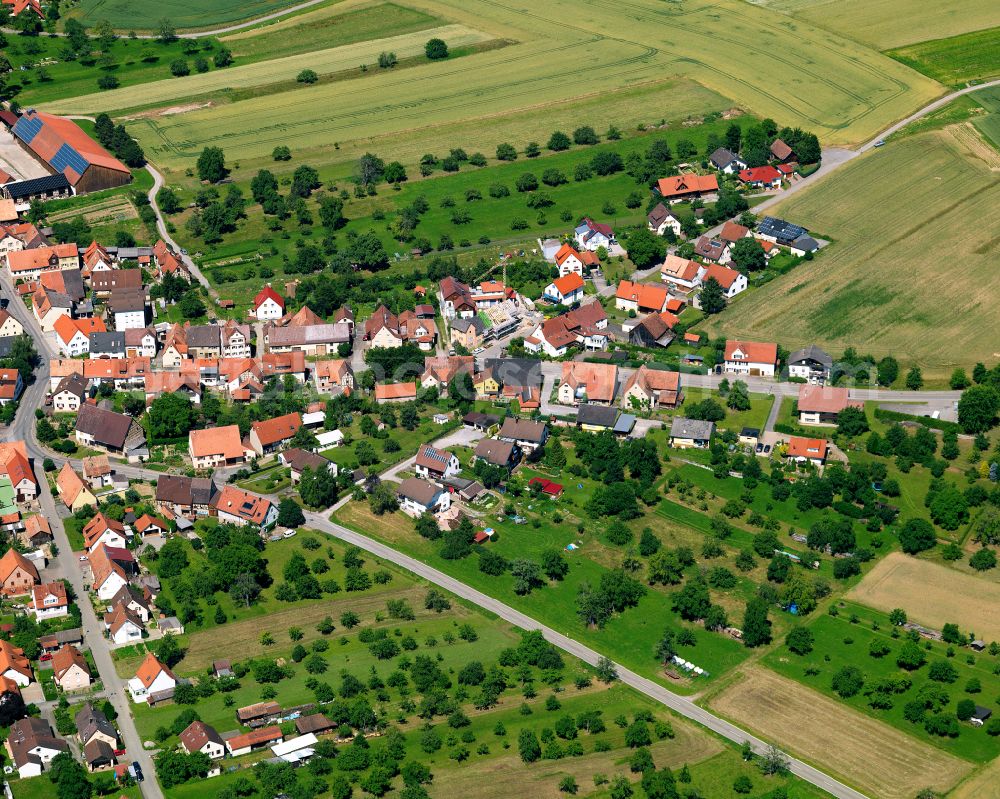 Aerial photograph Wachendorf - Agricultural land and field boundaries surround the settlement area of the village in Wachendorf in the state Baden-Wuerttemberg, Germany