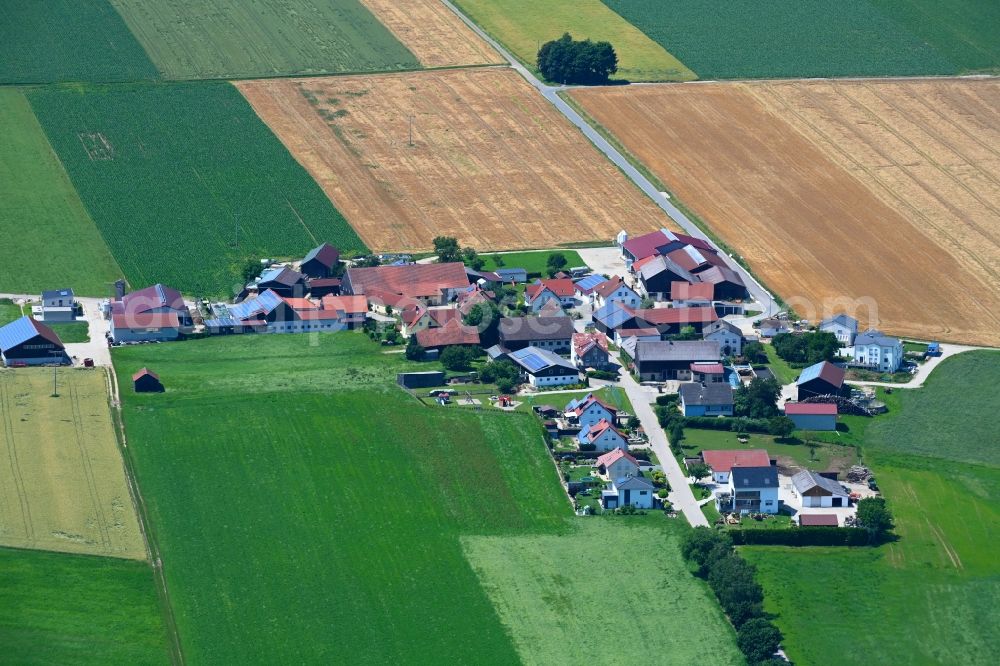 Aerial photograph Wackersberg - Agricultural land and field boundaries surround the settlement area of the village in Wackersberg in the state Bavaria, Germany