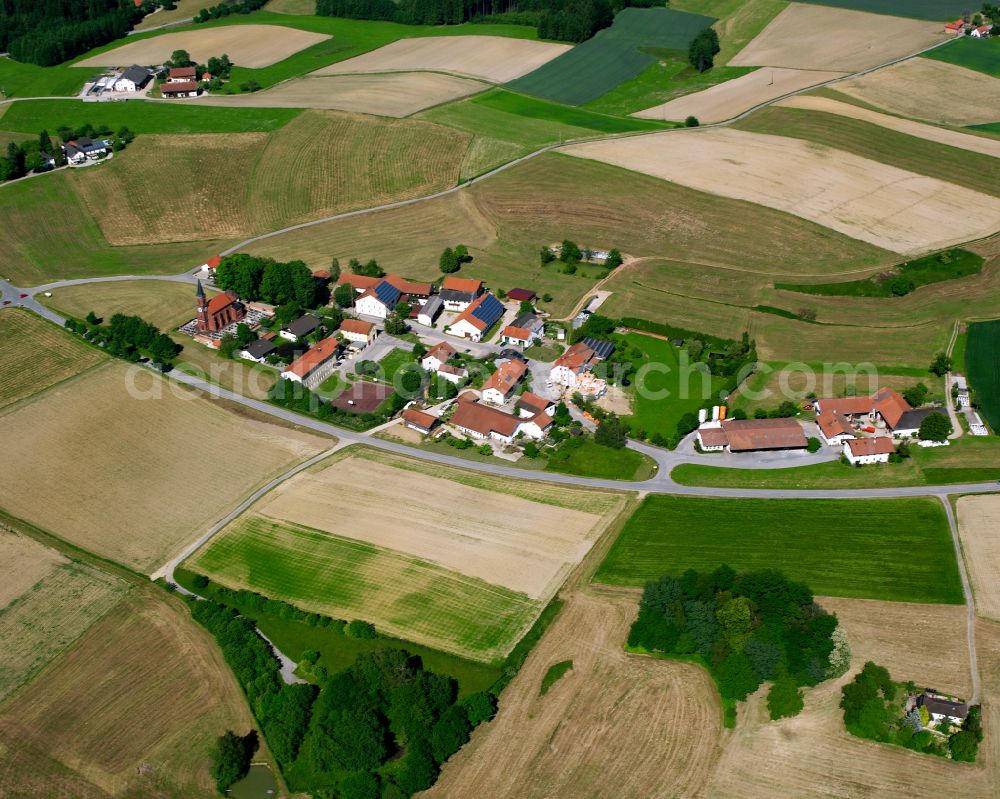 Wald b.Winhöring from above - Agricultural land and field boundaries surround the settlement area of the village in Wald b.Winhöring in the state Bavaria, Germany