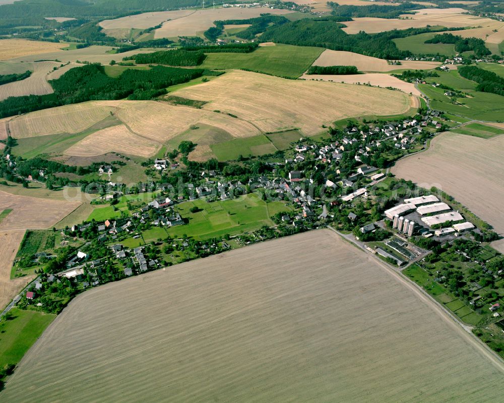 Waltersdorf from above - Agricultural land and field boundaries surround the settlement area of the village in Waltersdorf in the state Thuringia, Germany