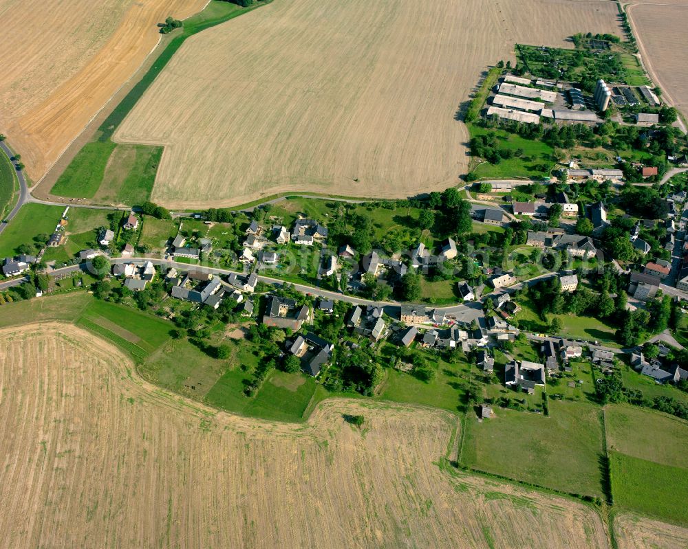 Waltersdorf from the bird's eye view: Agricultural land and field boundaries surround the settlement area of the village in Waltersdorf in the state Thuringia, Germany