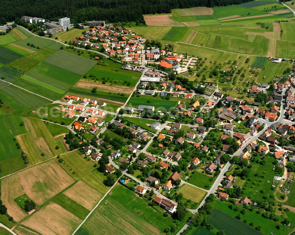 Wart from above - Agricultural land and field boundaries surround the settlement area of the village in Wart in the state Baden-Wuerttemberg, Germany