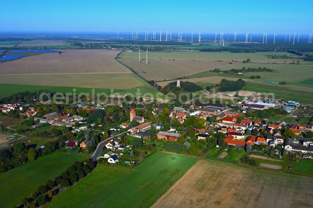 Aerial image Weesow - Agricultural land and field boundaries surround the settlement area of the village in Weesow in the state Brandenburg, Germany