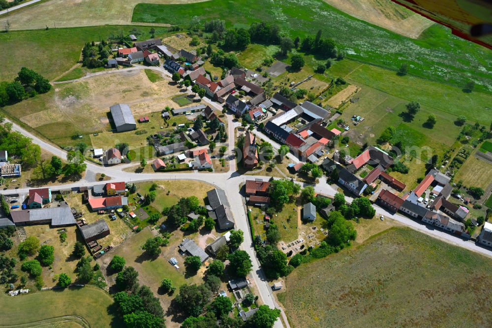 Weiden from the bird's eye view: Agricultural land and field boundaries surround the settlement area of the village in Weiden in the state Saxony-Anhalt, Germany