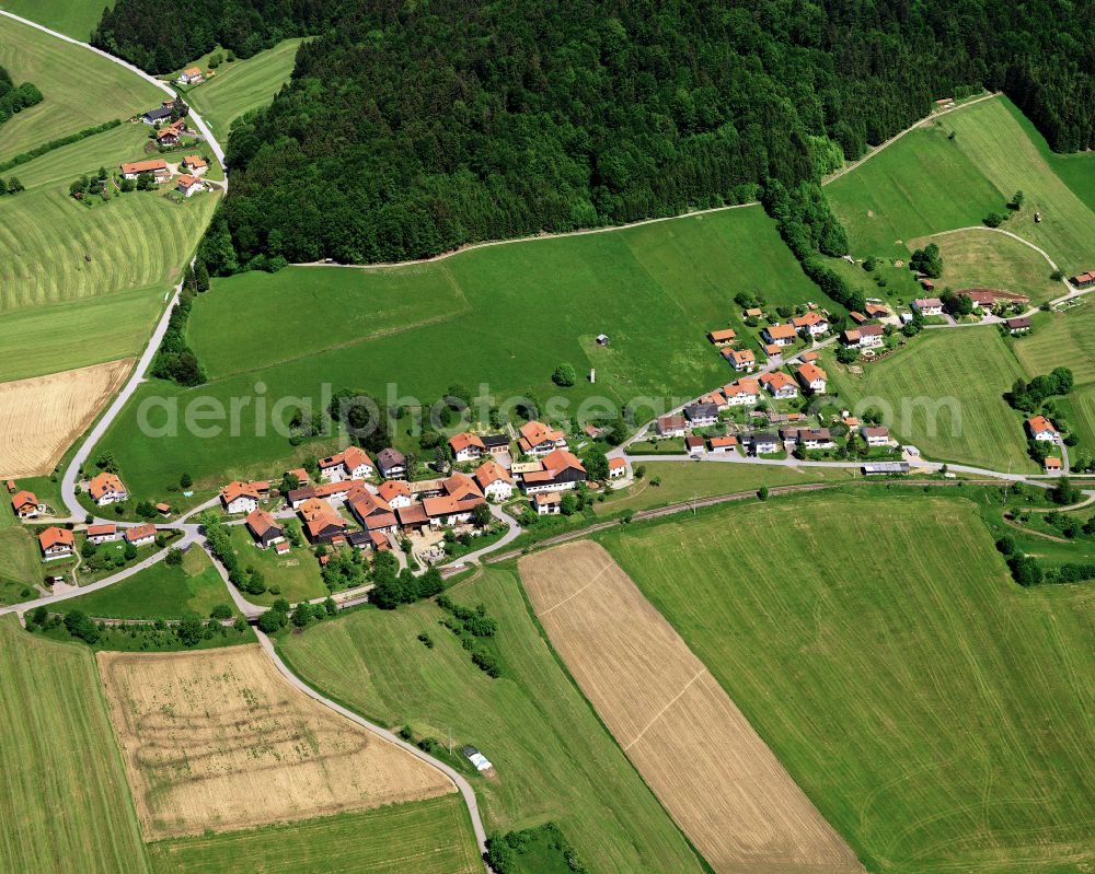 Werenain from above - Agricultural land and field boundaries surround the settlement area of the village in Werenain in the state Bavaria, Germany