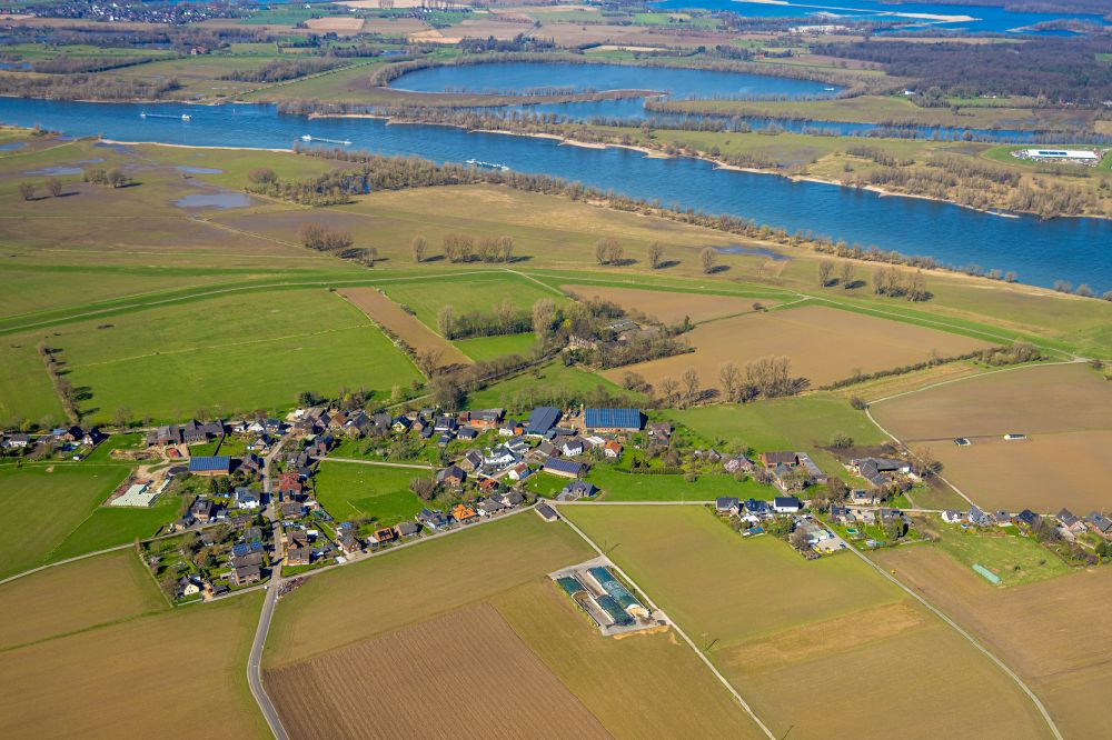 Aerial image Werrich - Agricultural land and field boundaries surround the settlement area of the village in Werrich in the state North Rhine-Westphalia, Germany
