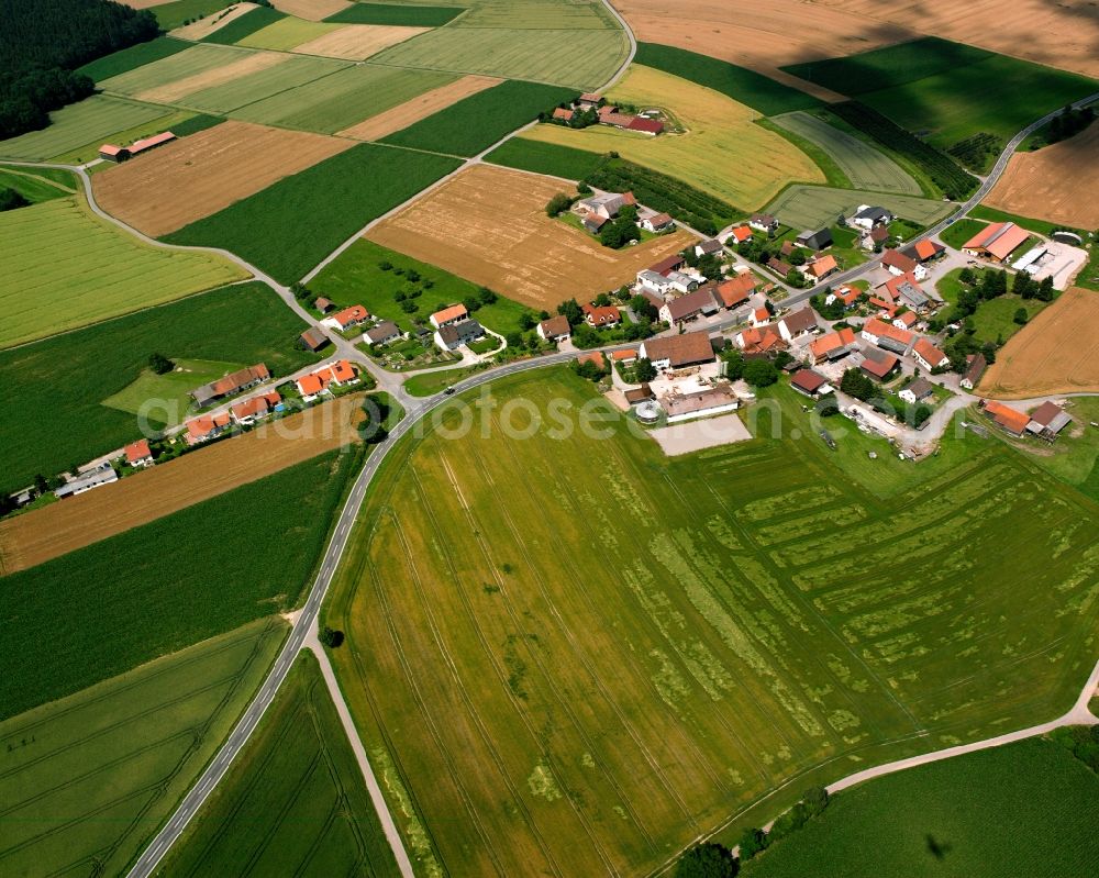 Aerial image Wilfertsweiler - Agricultural land and field boundaries surround the settlement area of the village in Wilfertsweiler in the state Baden-Wuerttemberg, Germany