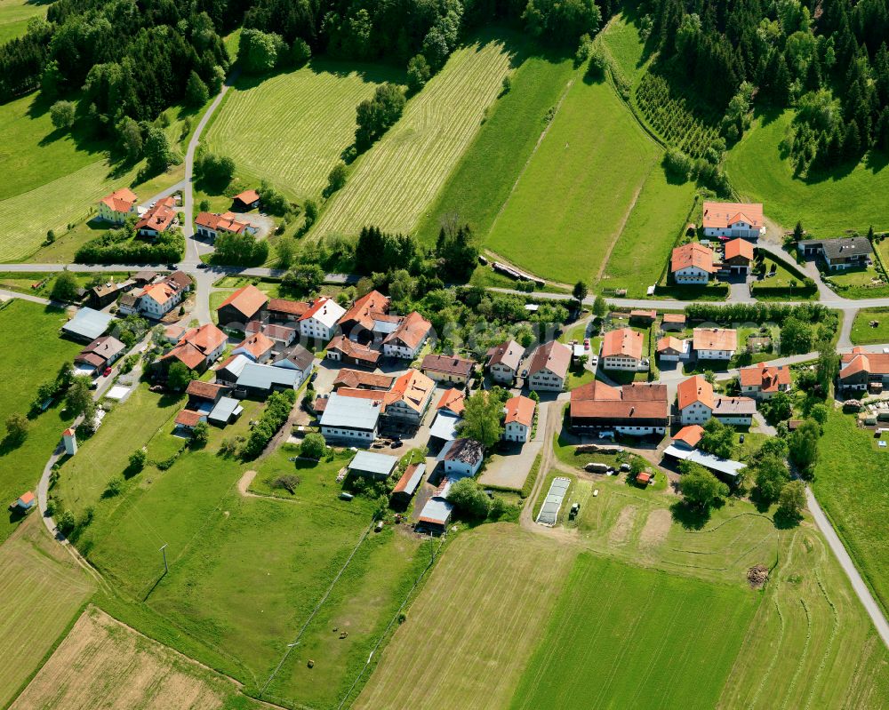 Winkelbrunn from the bird's eye view: Agricultural land and field boundaries surround the settlement area of the village in Winkelbrunn in the state Bavaria, Germany