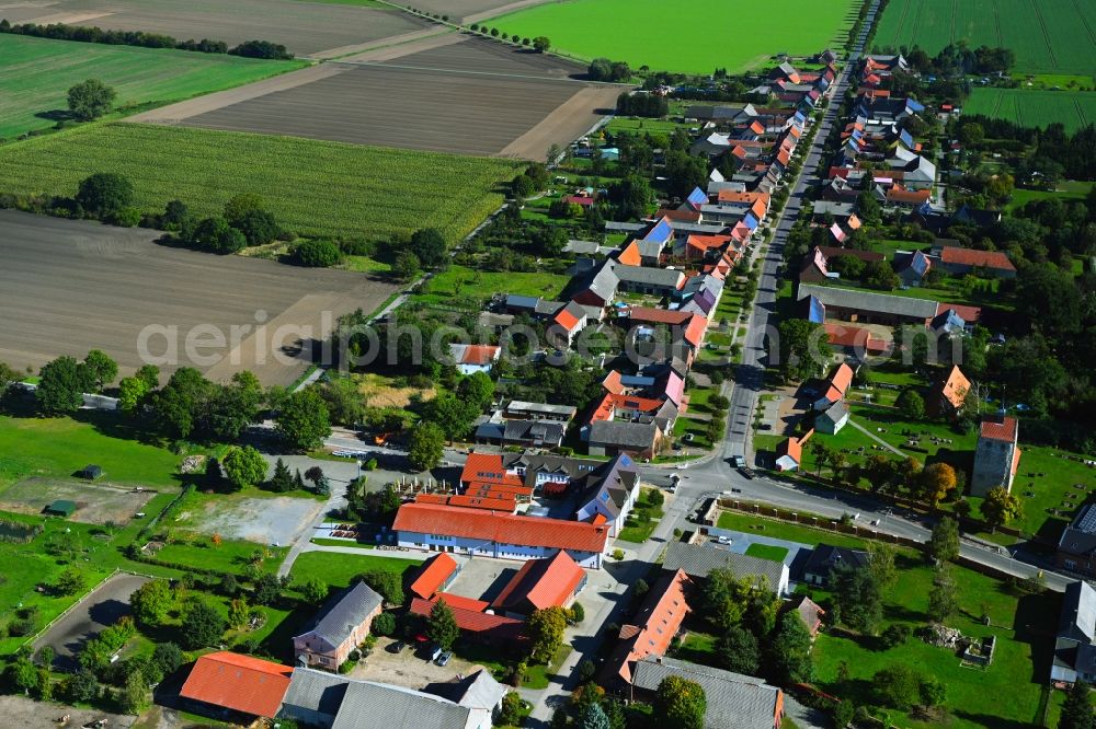 Winterfeld from above - Agricultural land and field boundaries surround the settlement area of the village in Winterfeld in the state Saxony-Anhalt, Germany