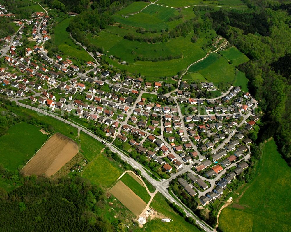 Winzingen from above - Agricultural land and field boundaries surround the settlement area of the village in Winzingen in the state Baden-Wuerttemberg, Germany