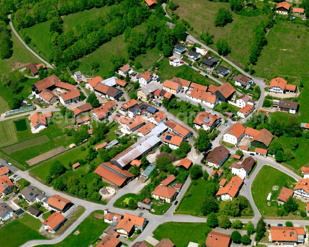 Aerial image Wollaberg - Agricultural land and field boundaries surround the settlement area of the village in Wollaberg in the state Bavaria, Germany