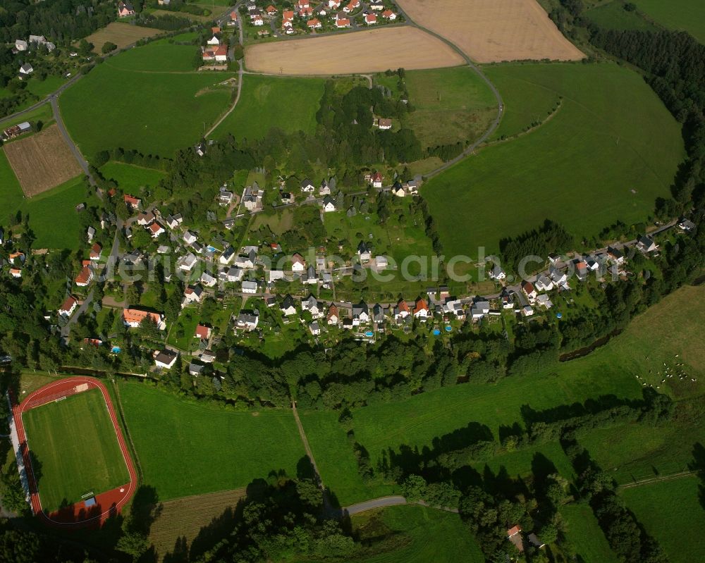 Zechendorf from above - Agricultural land and field boundaries surround the settlement area of the village in Zechendorf in the state Saxony, Germany