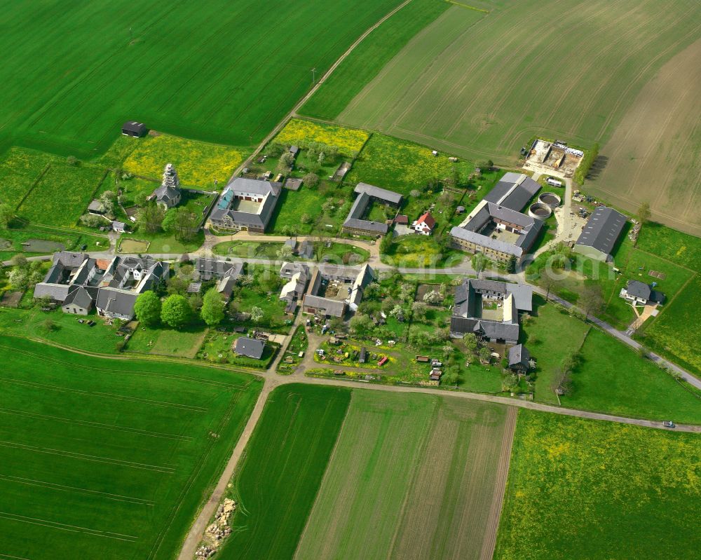 Zickra from the bird's eye view: Agricultural land and field boundaries surround the settlement area of the village in Zickra in the state Thuringia, Germany