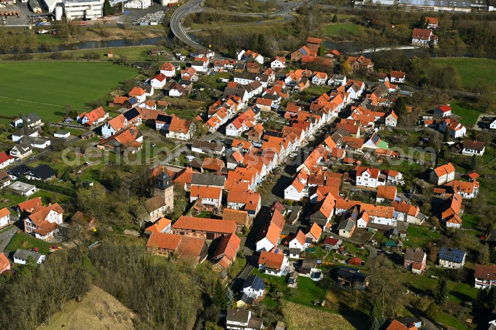 Neumorschen from above - Village on the river bank areas of Fulda along the Marktstrasse in Neumorschen in the state Hesse, Germany