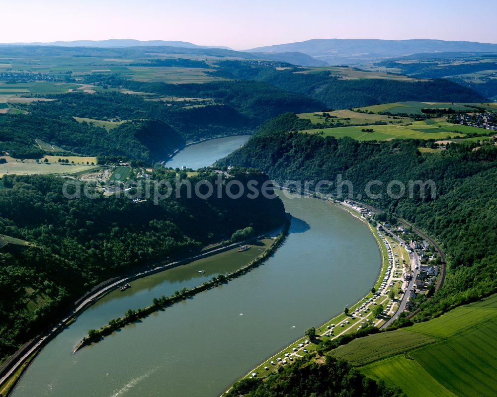 An der Loreley from the bird's eye view: Village on the river bank areas of the Rhine river in An der Loreley in the state Rhineland-Palatinate, Germany