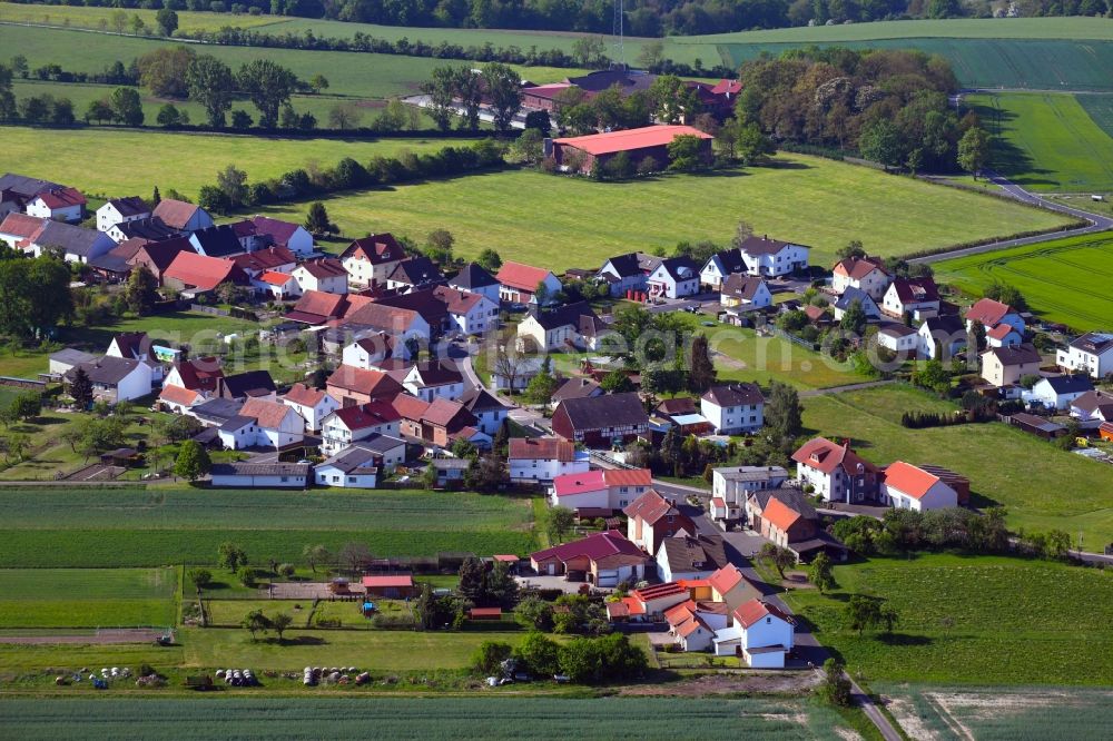 Gethsemane from the bird's eye view: Agricultural land and field borders surround the settlement area of the village in Gethsemane in the state Hesse, Germany