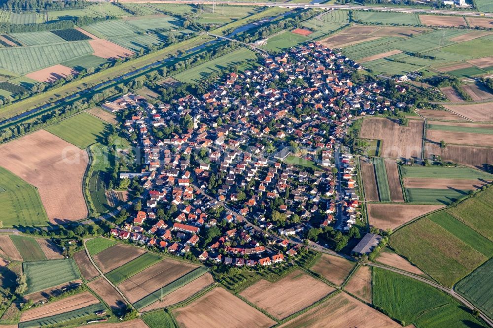 Aerial photograph Griesheim - Agricultural land and field borders surround the settlement area of the village in Griesheim in the state Baden-Wurttemberg, Germany