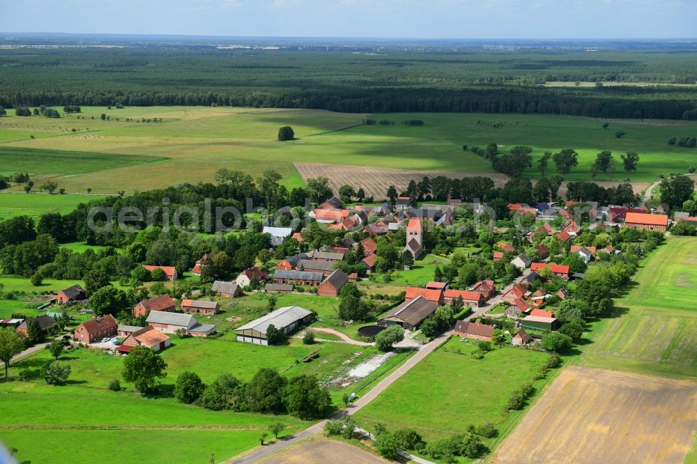 Groß Leppin from above - Agricultural land and field borders surround the settlement area of the village in Gross Leppin in the state Brandenburg, Germany