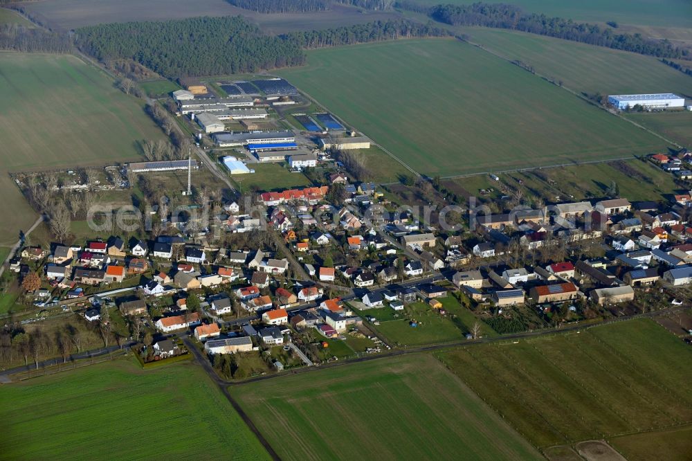 Aerial photograph Groß Schulzendorf - Agricultural land and field borders surround the settlement area of the village in Gross Schulzendorf in the state Brandenburg, Germany