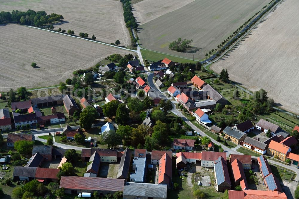 Hohengörsdorf from above - Agricultural land and field borders surround the settlement area of the village in Hohengoersdorf in the state Brandenburg, Germany