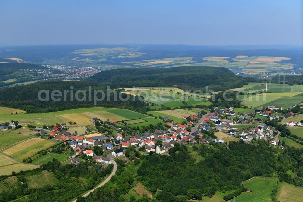 Jakobsberg from the bird's eye view: Agricultural land and field borders surround the settlement area of the village in Jakobsberg in the state North Rhine-Westphalia, Germany