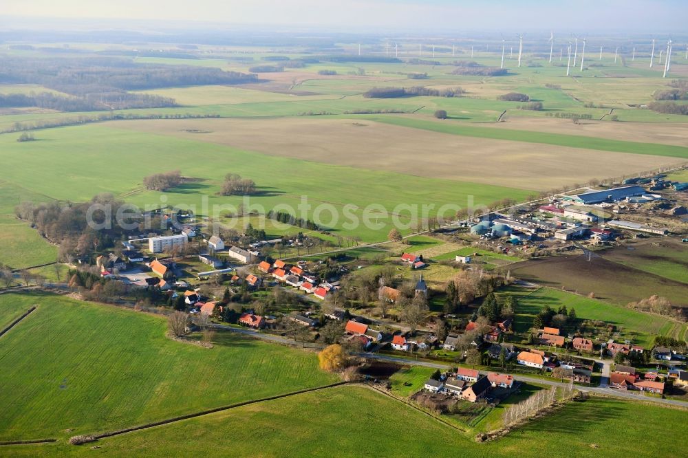 Aerial image Kambs - Agricultural land and field borders surround the settlement area of the village in Kambs in the state Mecklenburg - Western Pomerania, Germany