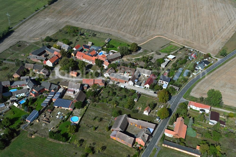 Aerial photograph Külso - Agricultural land and field borders surround the settlement area of the village in Kuelso in the state Saxony-Anhalt, Germany