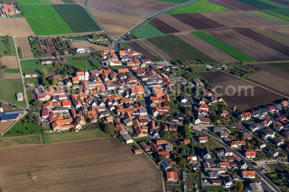 Aerial image Kolitzheim - Agricultural land and field borders surround the settlement area of the village in Kolitzheim in the state Bavaria, Germany