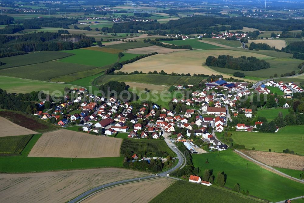 Aerial image Lauterbach - Agricultural land and field borders surround the settlement area of the village in Lauterbach in the state Bavaria, Germany