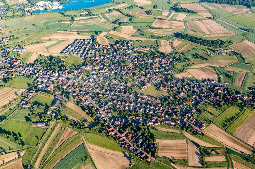 Aerial image Legelshurst - Agricultural land and field borders surround the settlement area of the village in Legelshurst in the state Baden-Wurttemberg, Germany
