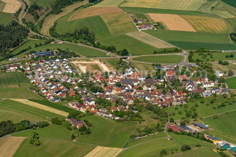 Aerial image Mauenheim - Agricultural land and field borders surround the settlement area of the village in Mauenheim in the state Baden-Wuerttemberg, Germany