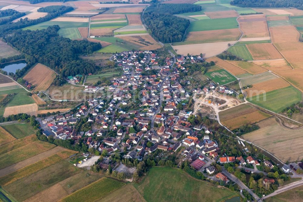 Aerial image Moos - Agricultural land and field borders surround the settlement area of the village in Moos in the state Baden-Wuerttemberg, Germany