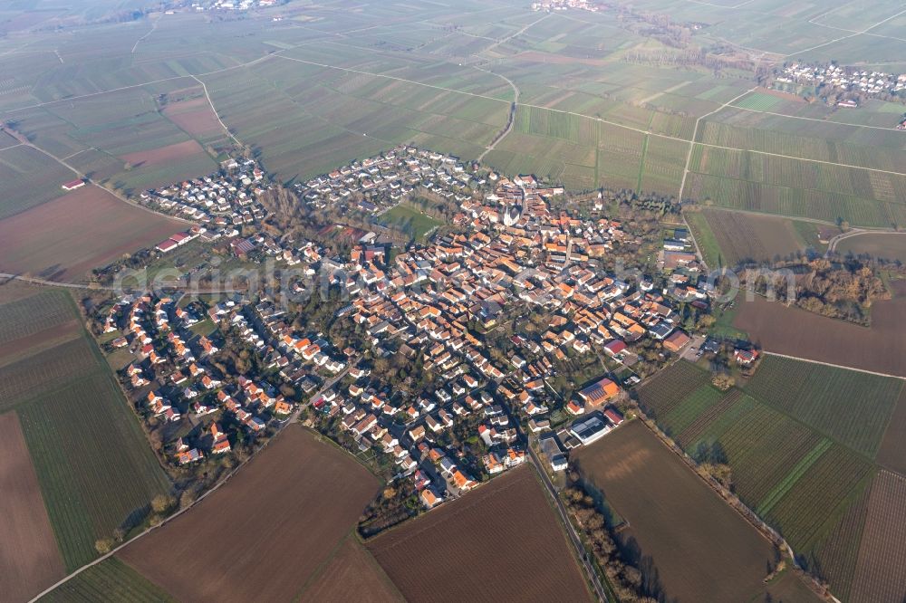 Aerial image Mörzheim - Agricultural land and field borders surround the settlement area of the village in Moerzheim in the state Rhineland-Palatinate, Germany