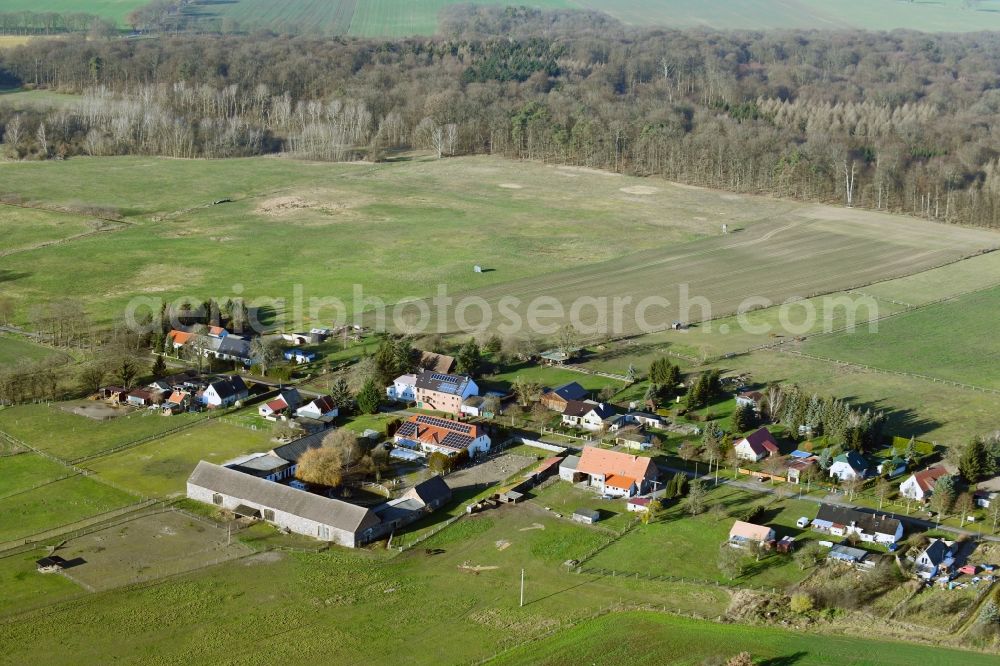 Aerial photograph Neulüdersdorf - Agricultural land and field borders surround the settlement area of the village in Neuluedersdorf in the state Brandenburg, Germany