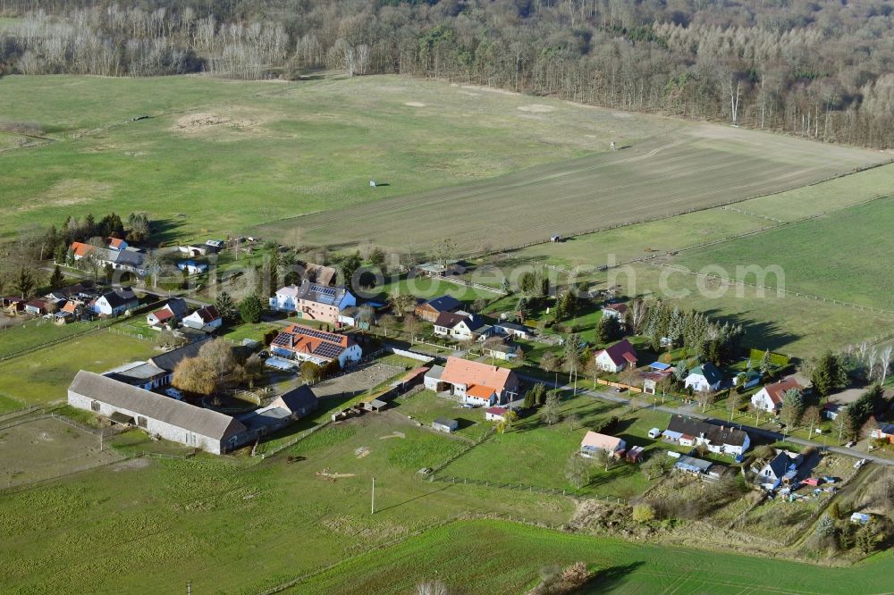 Neulüdersdorf from above - Agricultural land and field borders surround the settlement area of the village in Neuluedersdorf in the state Brandenburg, Germany