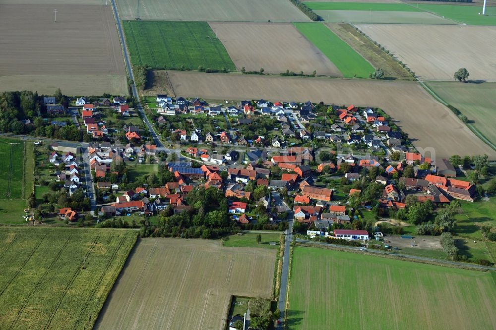 Aerial photograph Papenrode - Agricultural land and field borders surround the settlement area of the village in Papenrode in the state Lower Saxony, Germany