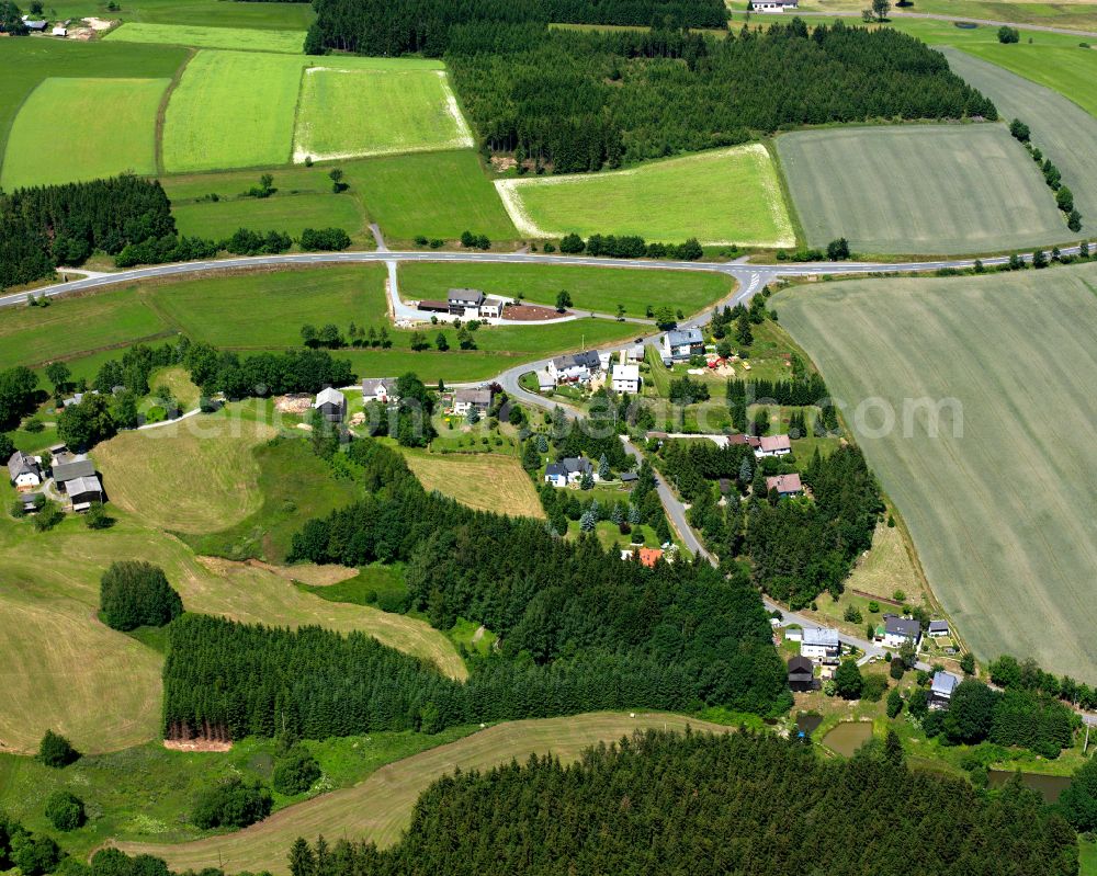 Aerial image Gerlas - Agricultural land and field boundaries with the power plants surround the settlement area of the village in Gerlas in the state Bavaria, Germany
