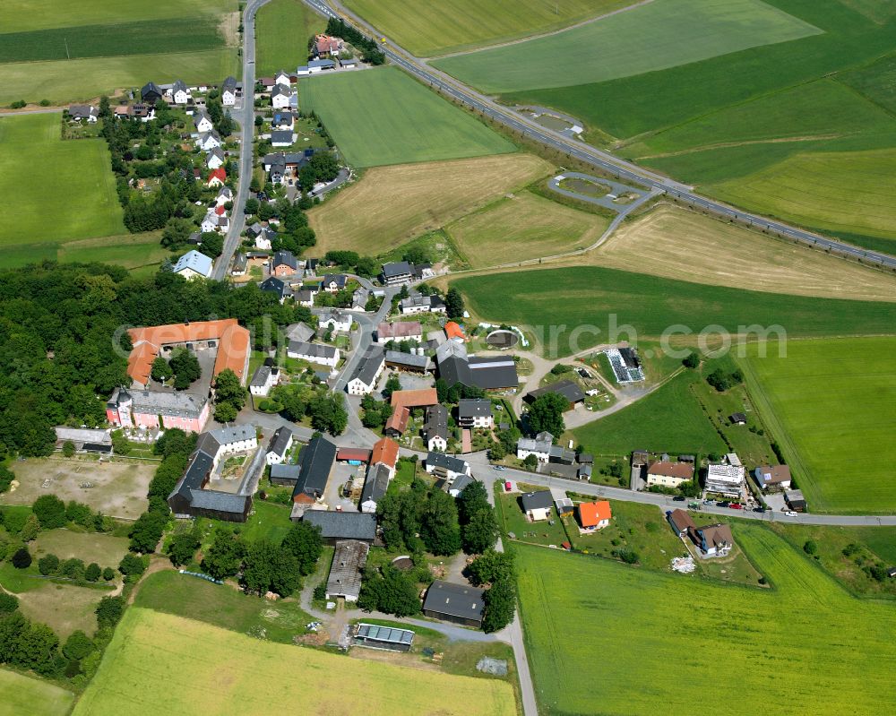 Aerial photograph Schloßgattendorf - Agricultural land and field boundaries with the power plants surround the settlement area of the village in Schloßgattendorf in the state Bavaria, Germany