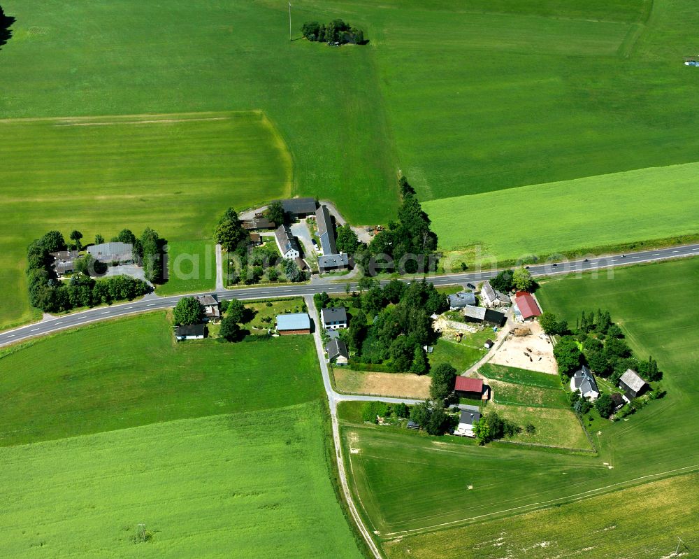 Aerial image Stollen - Agricultural land and field boundaries with the power plants surround the settlement area of the village in Stollen in the state Bavaria, Germany
