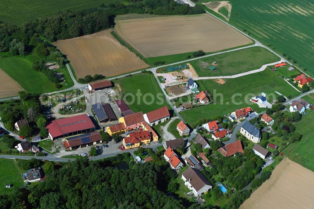 Aerial photograph Schirnaidel - Agricultural land and field borders surround the settlement area of the village in Schirnaidel in the state Bavaria, Germany