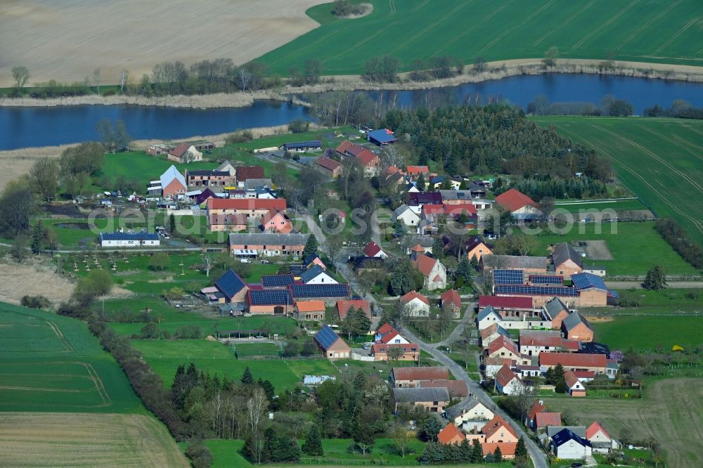 Bölkendorf from above - Village on the lake bank areas of Krummer See in Boelkendorf in the state Brandenburg, Germany